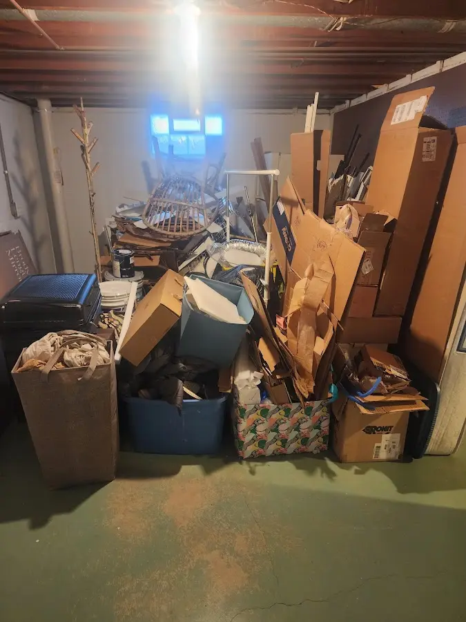 Roll-off dumpster container at job site for 2 Yard Dumpster Rental in Irving